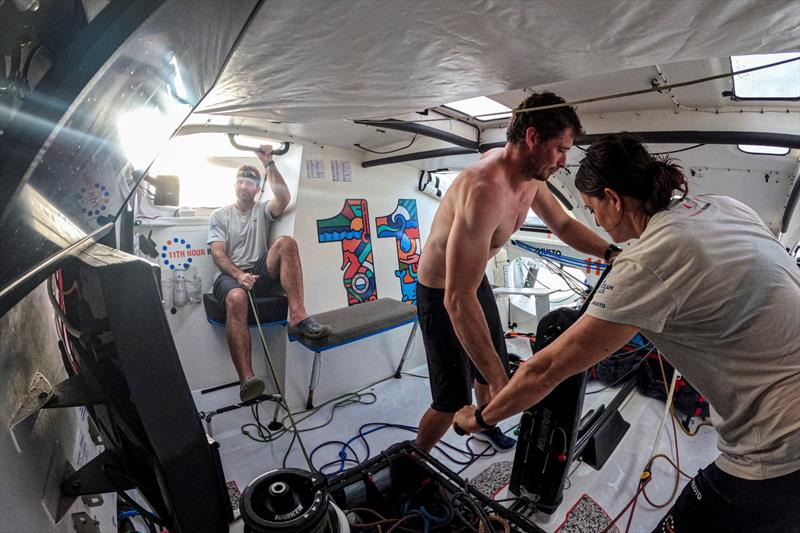 05 February 2023, Onboard 11th Hour Racing Team during Leg 2, Day 12. Charlie Enright in the driving seat with the mainsheet in hand while Jack Bouttell and Justine Mettraux grind photo copyright Amory Ross / 11th Hour Racing / The Ocean Race taken at  and featuring the IMOCA class