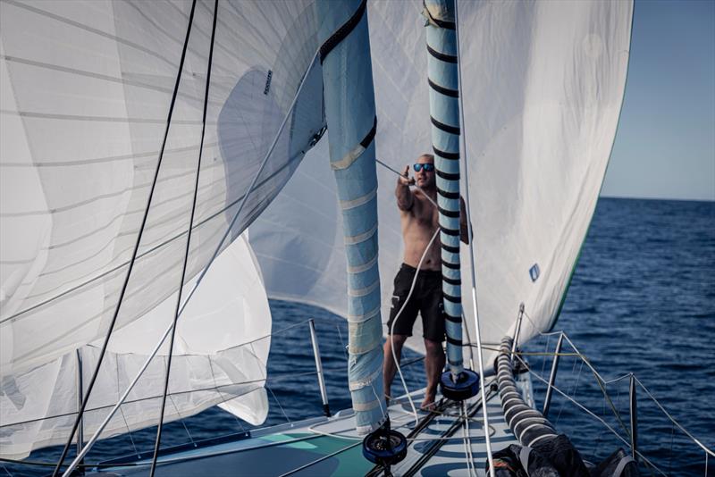 Damien and spi sheet - The Ocean Race Leg 2 photo copyright Anne Beaugé / Biotherm taken at  and featuring the IMOCA class