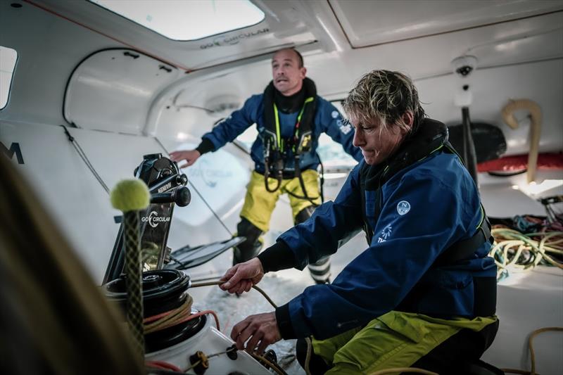 16 January , Leg 1 onboard Holcim - PRB Team. Abby Ehler and Kevin Escoffier keeping the boat going fast through the changeable conditions approaching Gibraltar. Constant trimming is required to maintain the best speed - photo © Julien Champolion / polaRYSE / Team Holcim-PRB