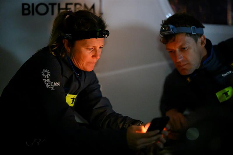 The Ocean Race 2022-23 - 27 February 2023, Leg 3 Start day onboard Biotherm. Sam Davies and Paul Meilhat check the tracker after departing Cape Town 10 hours after the start after getting the damage fixed - photo © Ronan Gladu / Biotherm