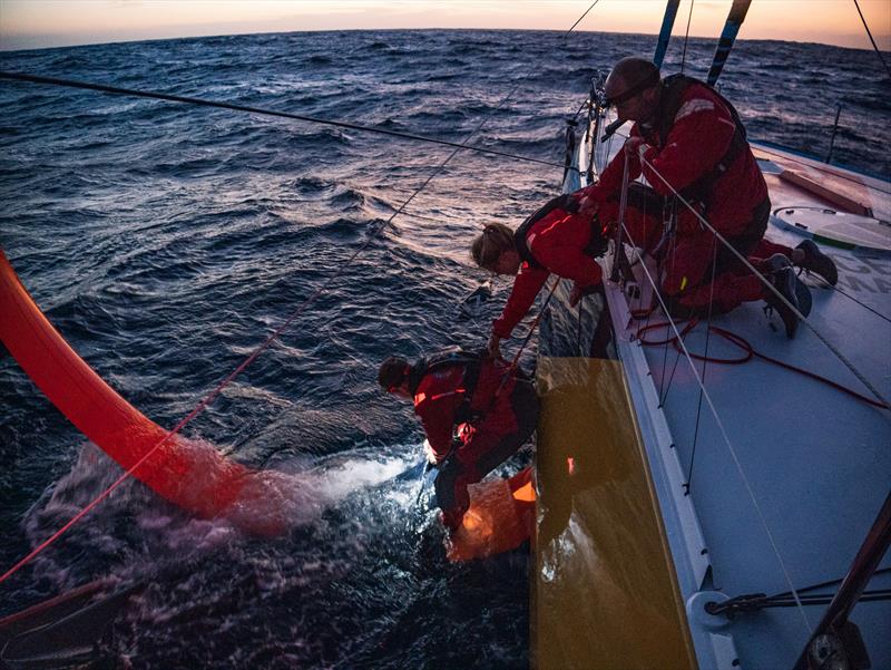 The Ocean Race 2022-23 Leg 3 day 2 onboard Team Malizia. Boris Herrmann, Rosalin Kuiper, Nicolas Lunven recovering the downwind sail - photo © Antoine Auriol / Team Malizia