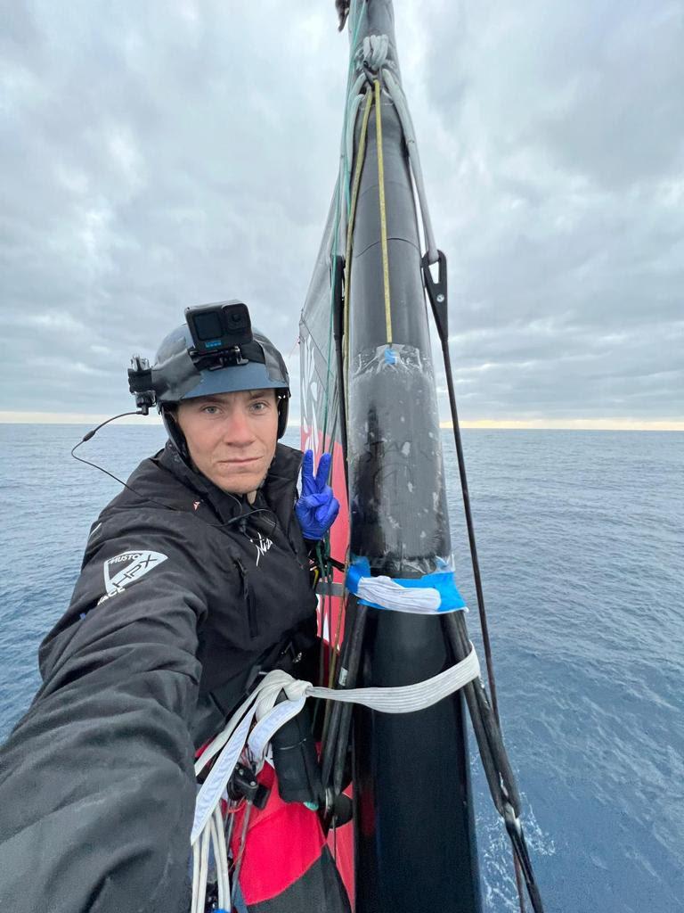 Will Harris part way through the mast repair  photo copyright Team Malizia taken at  and featuring the IMOCA class