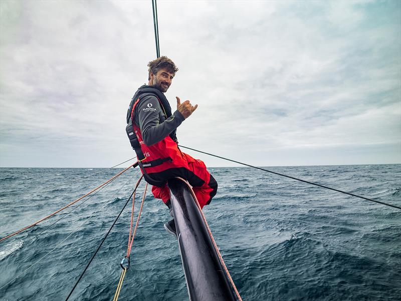 Image of Boris Herrmann on the outrigger assisting Rosalin Kuiper with the halyard repair - The Ocean Race - photo © Antoine Auriol