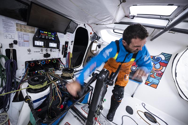 The Ocean Race 2022-23 Leg 3 onboard 11th Hour Racing Team, Charlie Enright grinding the main sheet - photo © Amory Ross / 11th Hour Racing / The Ocean Race
