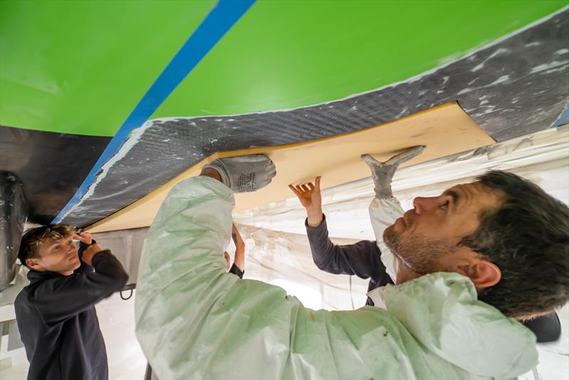 The Ocean Race 2022-23 GUYOT environnement - Team Europe shore crew works on the hull repair replacing the Nomex material - photo © Charles Drapeau / GUYOT environnement - Team Europe