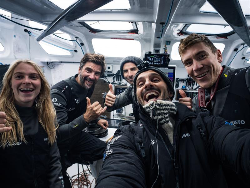 Rosalin Kuiper, Boris Herrmann, Nicolas Lunven, Antoine Auriol and Will Harris from Team Malizia celebrating their second place at the scoring gate photo copyright Antoine Auriol / Team Malizia taken at  and featuring the IMOCA class