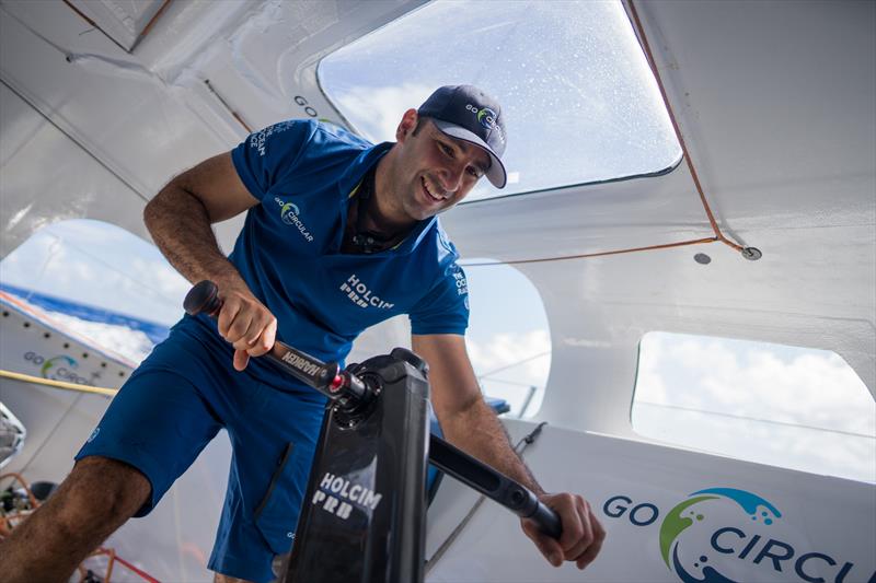 The Ocean Race 2022-23 Leg 4 onboard Team Holcim - PRB. Benjamin Schwartz trimming the sails photo copyright Georgia Schofield | polaRYSE / Holcim - PRB / The Ocean Race taken at  and featuring the IMOCA class