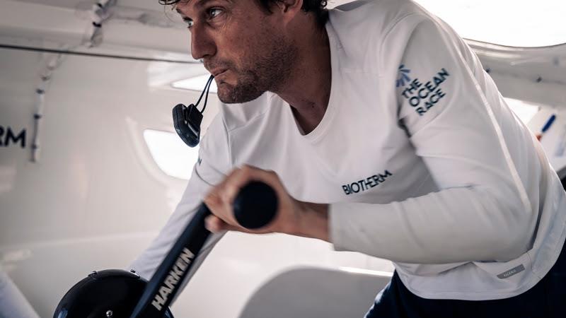 The Ocean Race 2022-23 - 26 April 2023, Leg 4 Day 3 onboard Biotherm. Skipper Paul Meilhat on the pedestal, holding the autopilot remote close by photo copyright Anne Beauge / Biotherm / The Ocean Race taken at  and featuring the IMOCA class