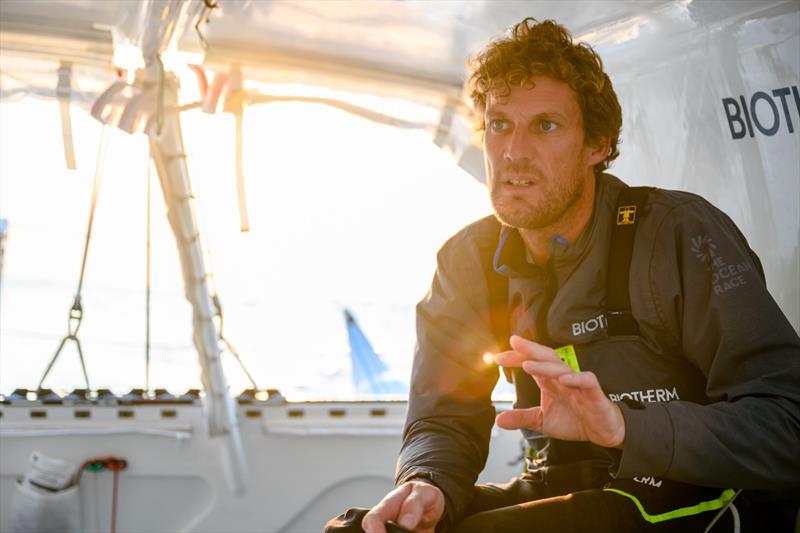 The Ocean Race 2022-23 - 21 May 2023, Leg 5, Day 1 onboard Biotherm. Skipper Paul Meilhat discussing the next sail change with his crew photo copyright Ronan Gladu / Biotherm / The Ocean Race taken at  and featuring the IMOCA class