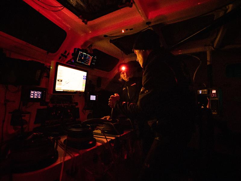 The Ocean Race 2022-23 - 24 May 2023, Leg 5, Day 3 onboard Team Malizia. Rosalin Kuiper and Will Harris discussing checking the settings in the computer - photo © Antoine Auriol / Team Malizia / The Ocean Race