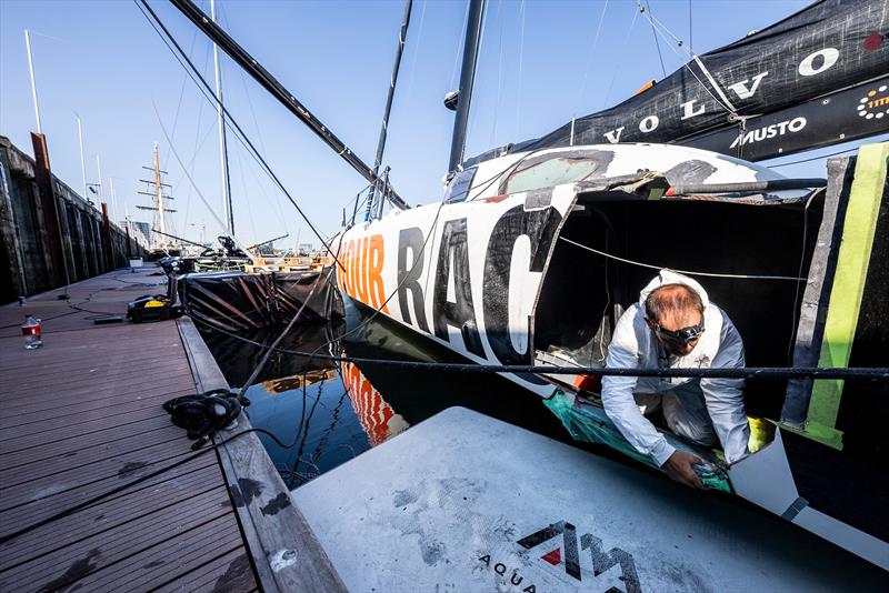 The 11th Hour Racing Team continues repairs after a collision during the start of Leg 7 - photo © Amory Ross / 11th Hour Racing Team