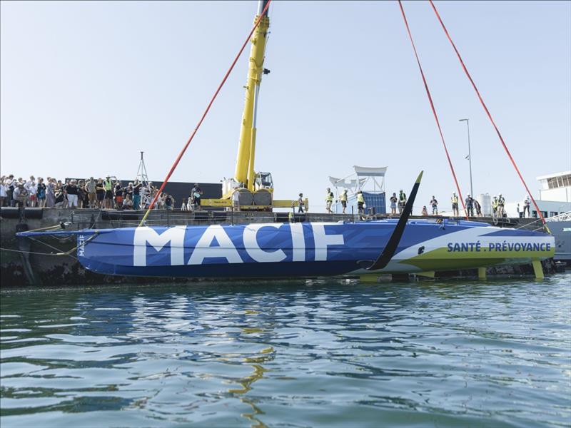 Charlie Dalin's new IMOCA MACIF Santé Prévoyance is launched in Concarneau, France photo copyright Steven Roussel / disobey / Macif taken at  and featuring the IMOCA class