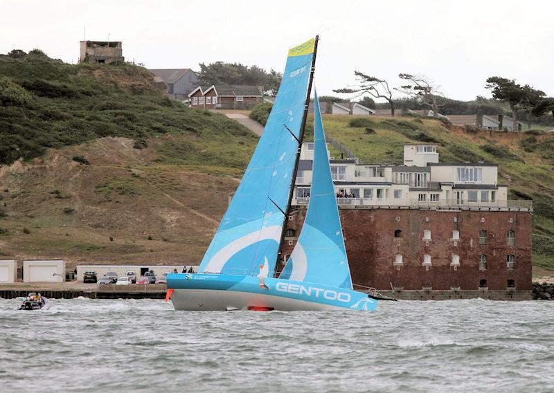 The 2023 Round the Island Race fleet pass through the Hurst narrows photo copyright Sam Jardine taken at Island Sailing Club, Cowes and featuring the IMOCA class