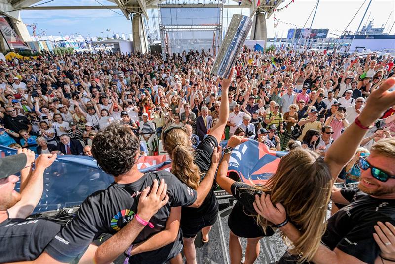 Team Malizia lifting the trophy for second place in the In-Port Series - The Ocean Race 2022-23 photo copyright Sailing Energy / The Ocean Race taken at  and featuring the IMOCA class