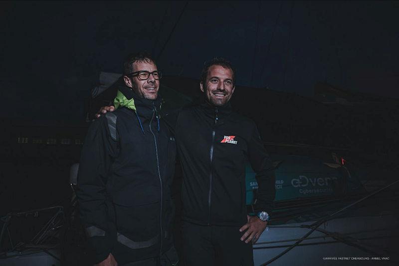 Antoine Koch and Sam Goodchild on For the Planet finish the 50th Rolex Fastnet Race photo copyright Armel Vrac / Arrivée Fastnet Cherbourg taken at Royal Ocean Racing Club and featuring the IMOCA class