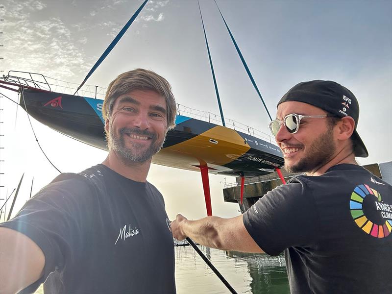 A happy skipper Boris Herrmann and Head of Composite Clément Caumont during the boat launch photo copyright Boris Herrmann / Team Malizia taken at  and featuring the IMOCA class