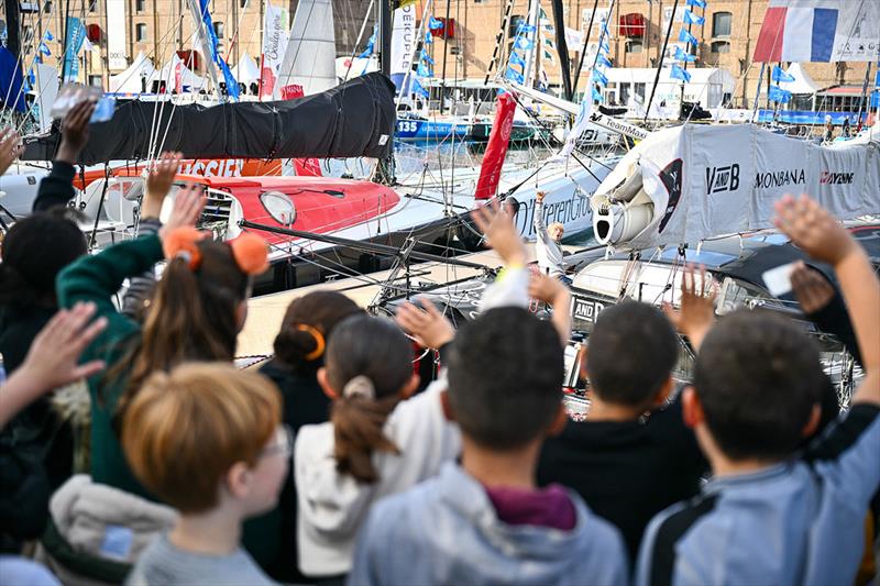 Kids are visiting Team Vand B - Monbana - Mayenne skipper Maxime Sorel before the Transat Jacques Vabre, in Le Havre, France - photo © Jean-Louis Carli / Alea