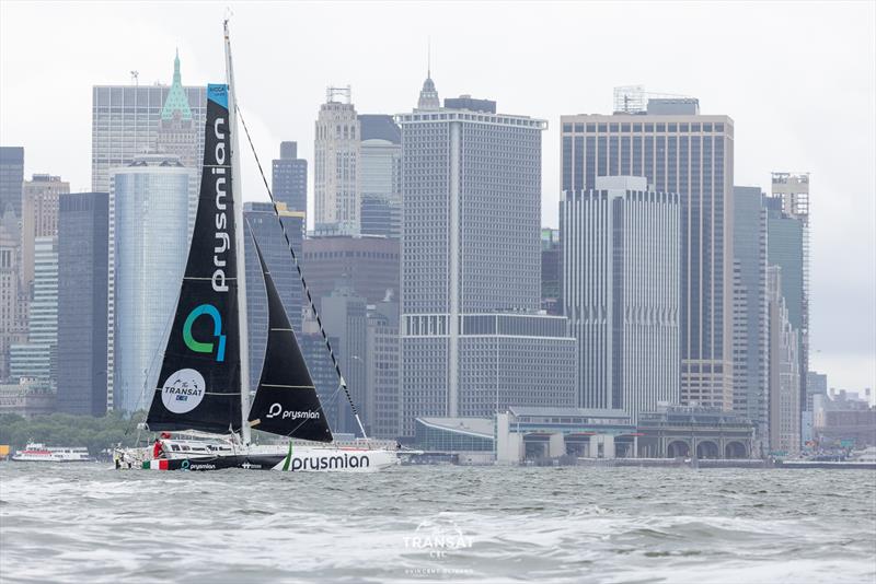 Giancarlo Pedote crosses the finish line of the Transat CIC 2024 photo copyright Vincent Olivaud taken at  and featuring the IMOCA class