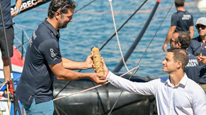 Baton handover with Yoann Richomme, skipper of Team Paprec Arkea, during Dock-out for the start of Leg 4 during The Ocean Race Europe in Nice, France - photo © Jean-Louis Carli / The Ocean Race Europe 2025