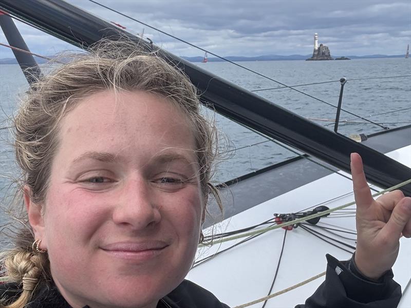 Elodie Bonafous rounds the Fastnet rock in the 1000 Race photo copyright Elodie Bonafous / 1000 Race taken at  and featuring the IMOCA class