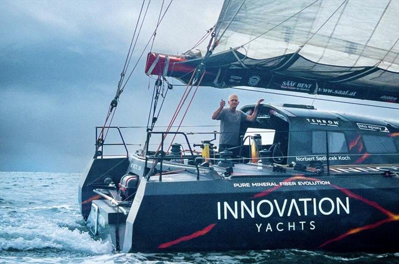 Norbert waving Open60AAL stern after departure photo copyright Innovation Yachts taken at  and featuring the IMOCA class