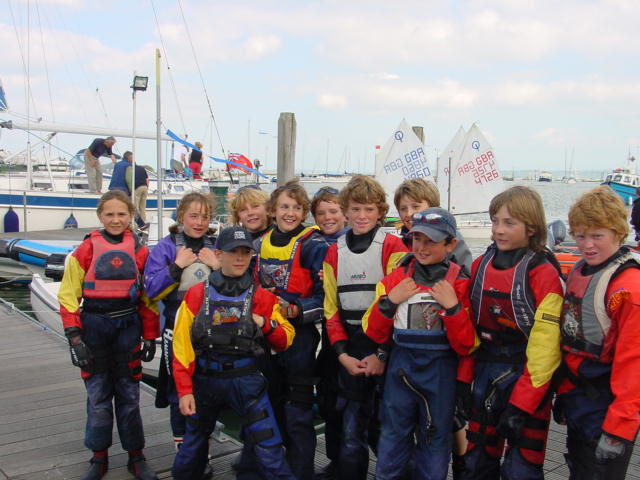 The Lymington Optimists flotilla are tired but triumphant after completing their sail around the Isle of Wight photo copyright Jane Porter taken at Royal Lymington Yacht Club and featuring the Optimist class
