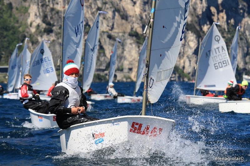 32nd Lake Garda Optimist Easter Regatta day 1 at World Youth Sailing Week photo copyright Elena Giolai taken at Fraglia Vela Riva and featuring the Optimist class