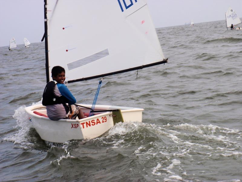 Chitresh Thatha on day 1 of the SF by Sonata India International Regatta photo copyright Sucharita Kamath taken at  and featuring the Optimist class