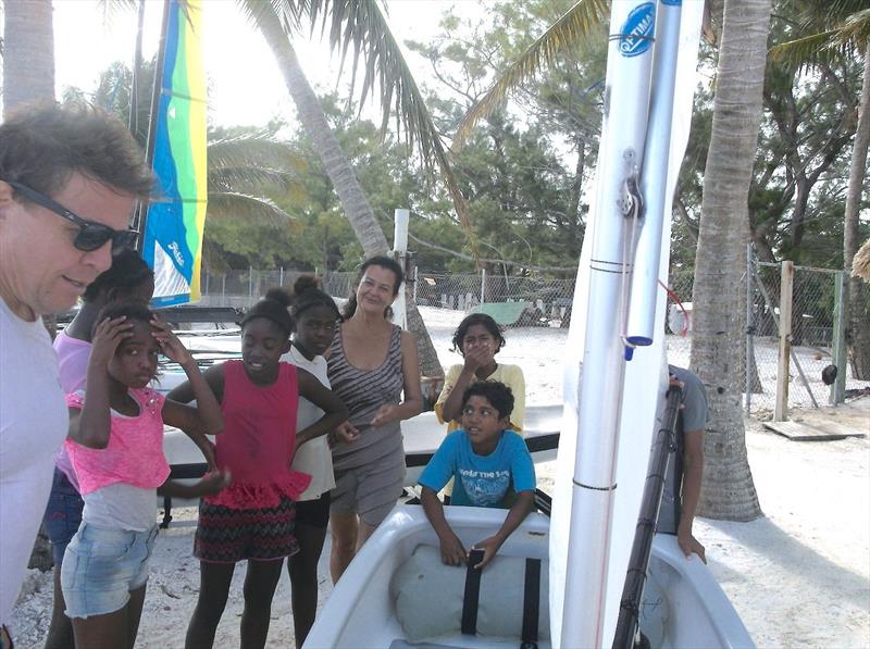 Ernie Martin explains boat parts to the new students at Adelle's International Outreach Programme photo copyright SPSC taken at San Pedro Sailing Club and featuring the Optimist class