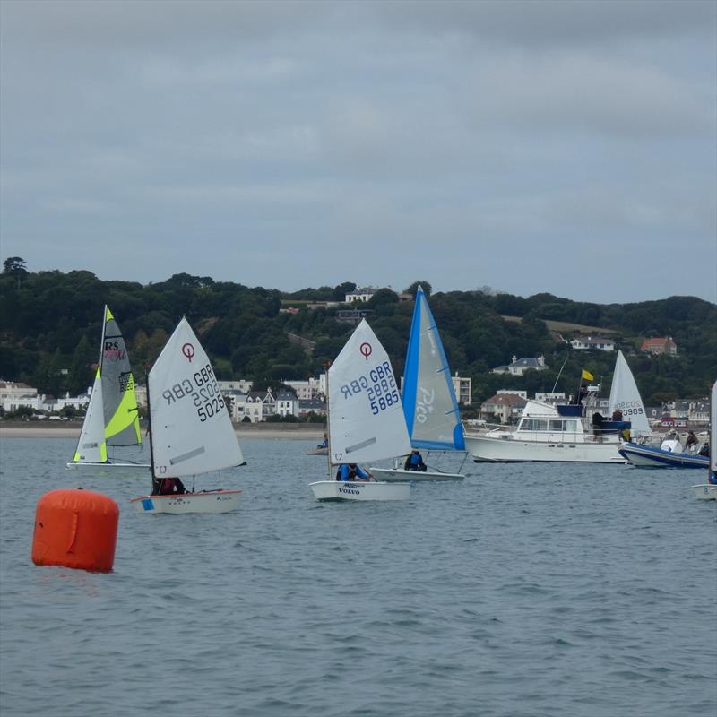Class 8 - 'slow' dinghy start at the Carey Olsen Jersey Regatta 2021 photo copyright Elaine Burgis taken at Royal Channel Islands Yacht Club and featuring the Optimist class
