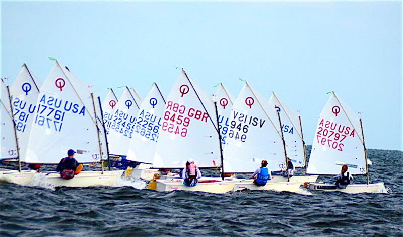 Stephan Baker takes the lead off the start line in the Green Division race in Set 5 in the 2018 Optimist National Championship sailed out of Pensacola Yacht Club photo copyright Talbot Wilson taken at Pensacola Yacht Club and featuring the Optimist class