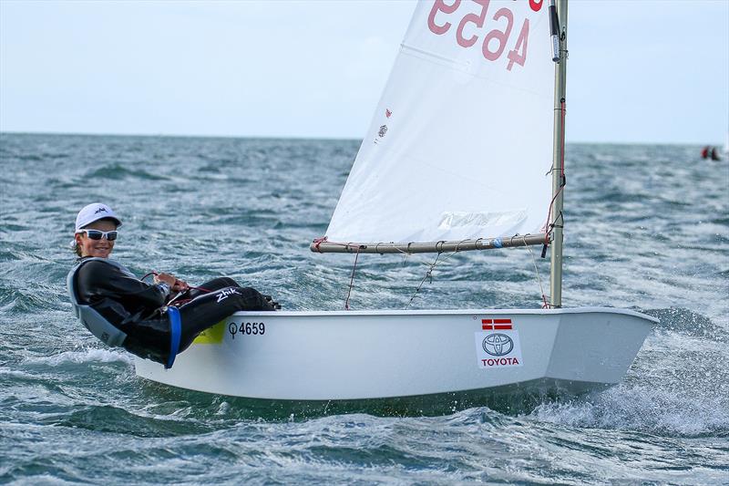 George Lee Rush (Wakatere BC) - 2019 National Champion- heads for the finish line and his fourth win on Day 6 - 2019 Toyota New Zealand Optimist National Championships, Murrays Bay, April 2019 photo copyright Richard Gladwell taken at Murrays Bay Sailing Club and featuring the Optimist class