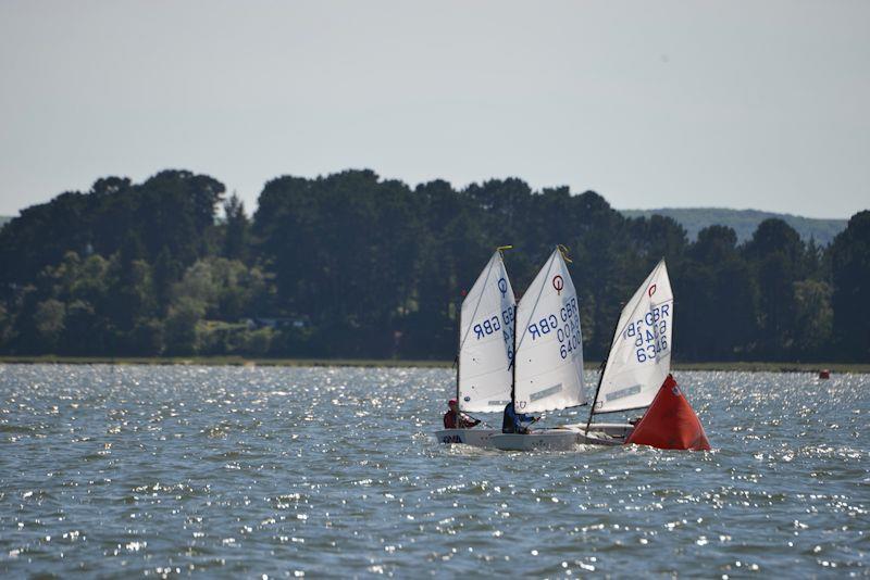 Main fleet leaders reach the windward mark in the IOCA Southern Area Championships at Parkstone photo copyright Rob McCormick taken at Parkstone Yacht Club and featuring the Optimist class
