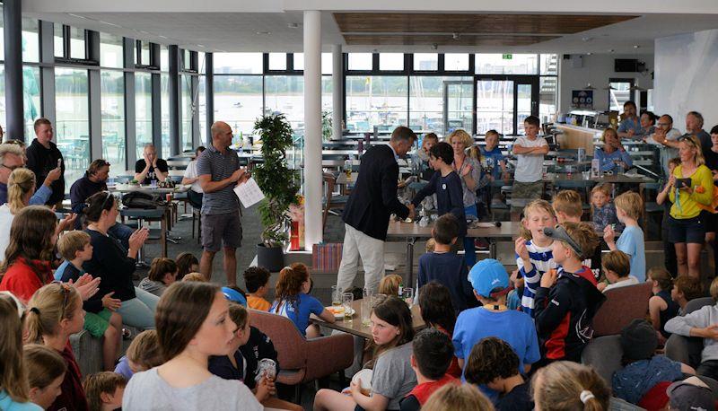 Vice Commodore, Gary Wakefield, presents the prizes in the IOCA Southern Area Championships at Parkstone photo copyright Rob McCormick taken at Parkstone Yacht Club and featuring the Optimist class