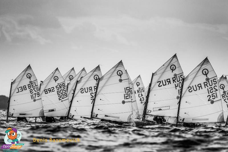 2019 OptiOrange Valencia photo copyright Denis Razumovich taken at Real Club Nautico Valencia and featuring the Optimist class