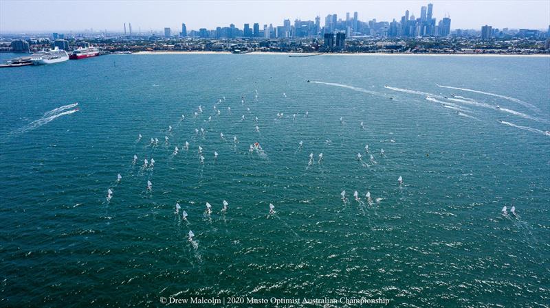 The Optimist fleet sailing in front of a now clear Melbourne skyline - 2020 Musto Optimist Australian and Open Championship - photo © Drew Malcolm
