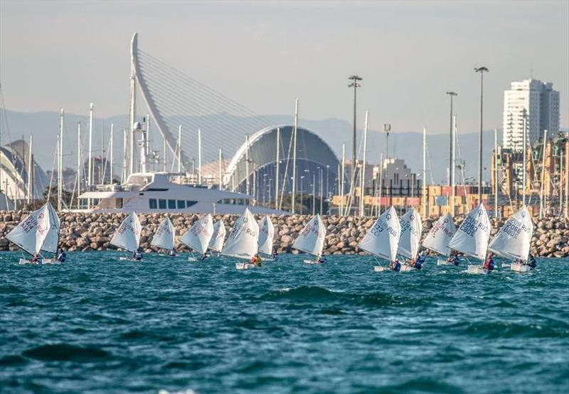 OptiOrange Valencia photo copyright Denis Razumovich taken at Real Club Nautico Valencia and featuring the Optimist class