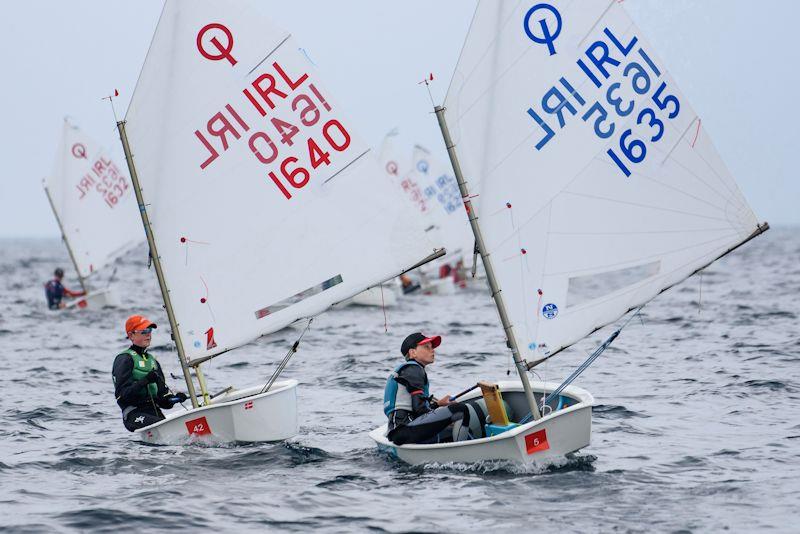 Ben O'Shaughnessy ahead of Johnny Flynn in the AIB Irish Optimist National Championships photo copyright Robert Bateman / Castlewhite Waterfall taken at Royal Cork Yacht Club and featuring the Optimist class