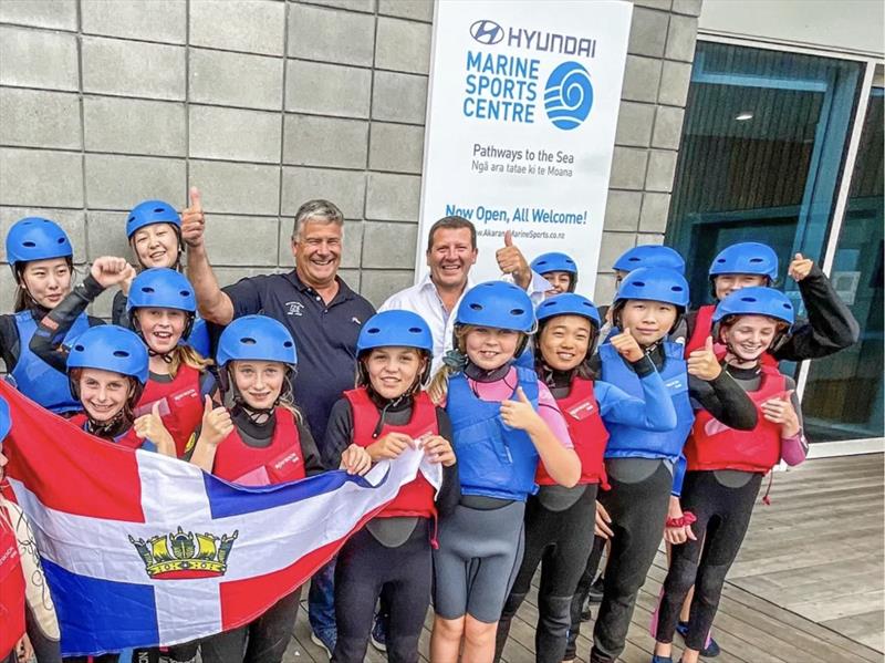 Commodore Jason Morgan with David Duff from Doyle Sails and young sailors from the Akarana Sailing Academy photo copyright Royal Akarana YC taken at Royal Akarana Yacht Club and featuring the Optimist class