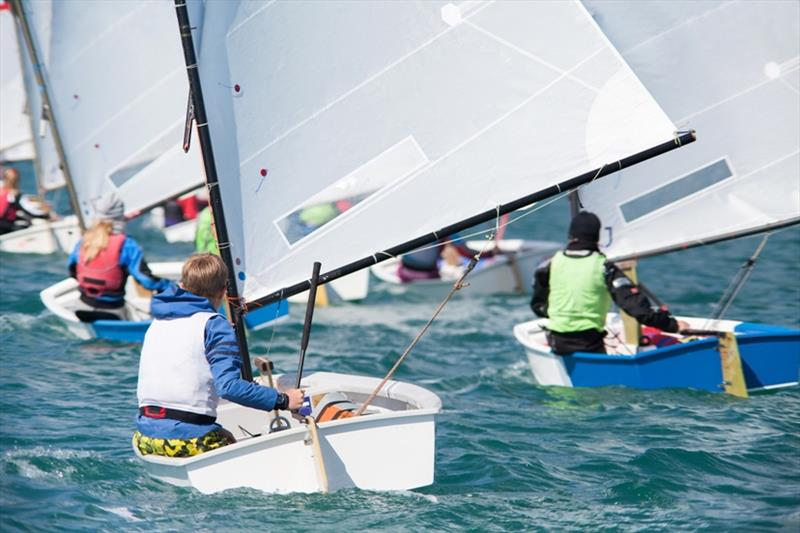 Group of children on sailing boats competing in the regatta at sea - photo © 2016 YanLev / Shutterstock