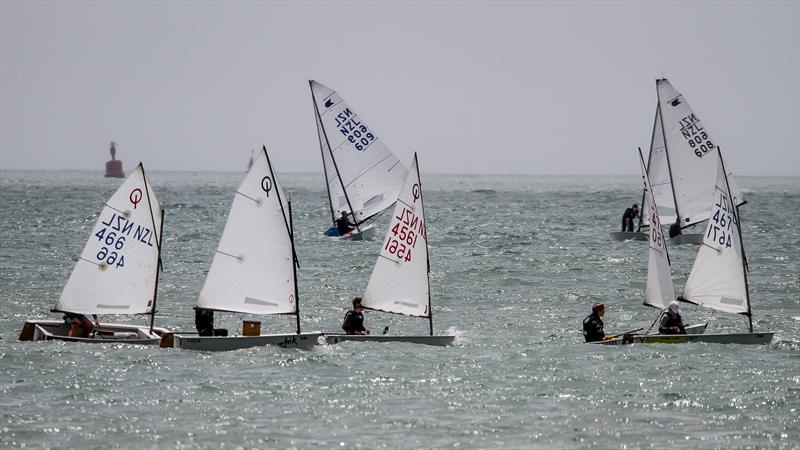 Optimists and OK Dinghies sailing ahead of the advancing sea-mist - Wakatere BC October 25, 2021 photo copyright Richard Gladwell / Sail-World.com taken at Wakatere Boating Club and featuring the Optimist class