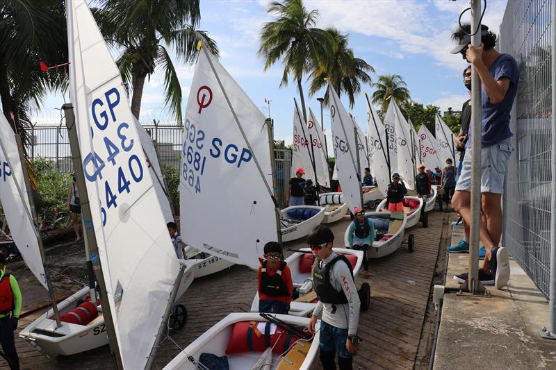 Young sailors standing by for launch off Raffles Marina’s ramp - Raffles Marina Optimist Regatta 2022 - photo © Raffles Marina