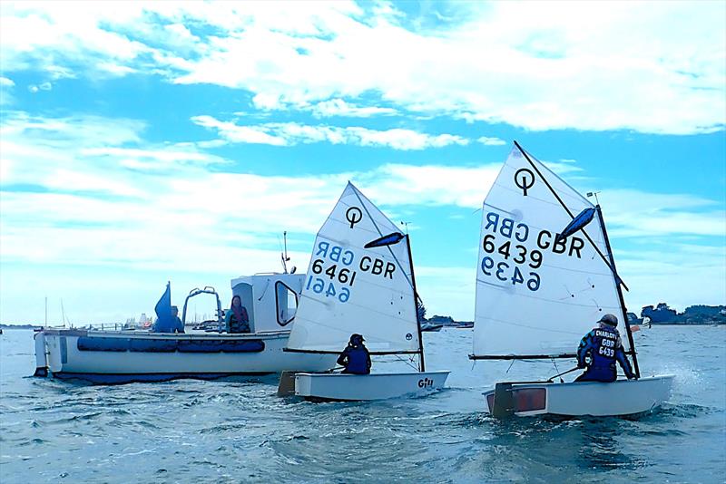 Close finish between Charlotte O'Keeffe and Amina Melhem - Red Ribbon Regatta at Hayling Island photo copyright Melvyn Cooper taken at Hayling Island Sailing Club and featuring the Optimist class