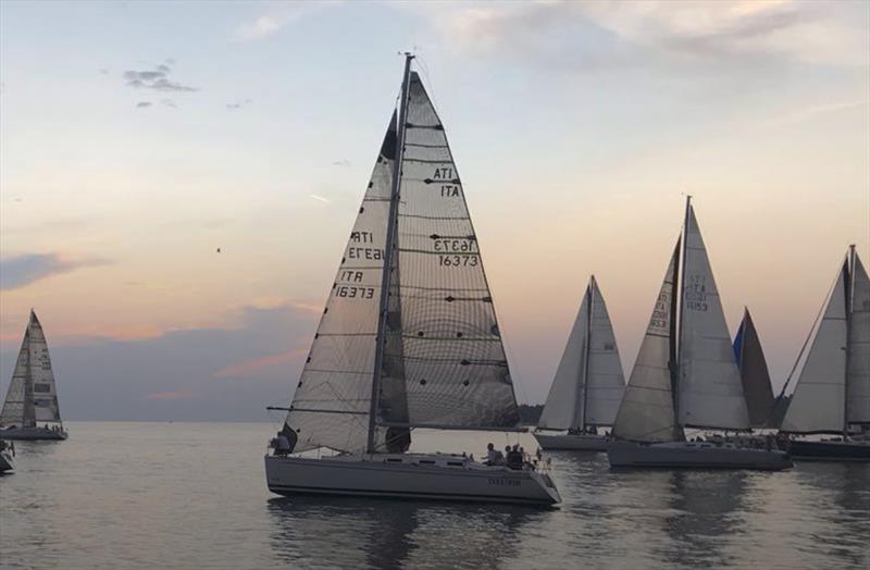 ITA-16373 Le Pelican sinks in the Regata dei Tre Golfi photo copyright ROLEX / Studio Borlenghi taken at Circolo del Remo e della Vela Italia and featuring the ORC class