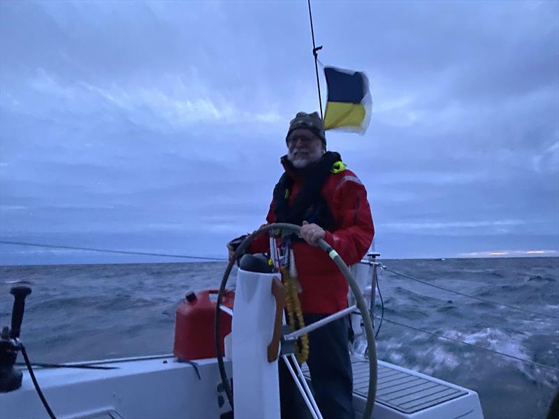 Paul Bieker driving Dark Star as the sun vanishes from the evening sky - photo © David Schmidt