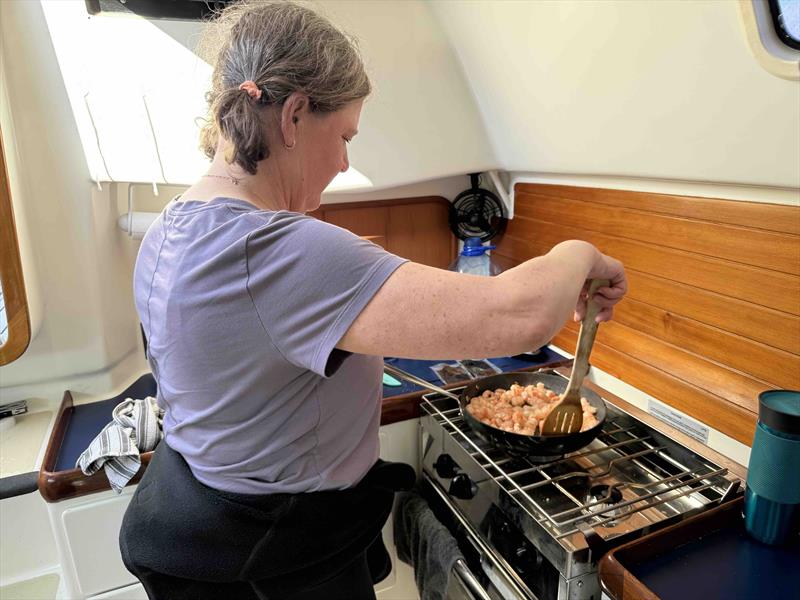 KAM saved my bacon by helping to cook a rice stir fry dinner with fresh and local black tiger prawns photo copyright David Schmidt taken at Seattle Yacht Club and featuring the ORC class