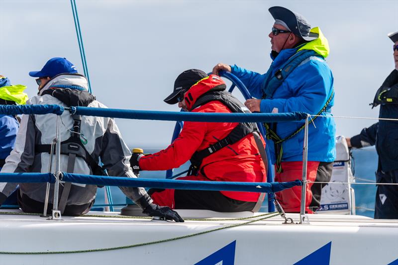 Matt Fahey on the helm of Faster Forward photo copyright Michael Currie taken at Ocean Racing Club of Victoria and featuring the ORC class