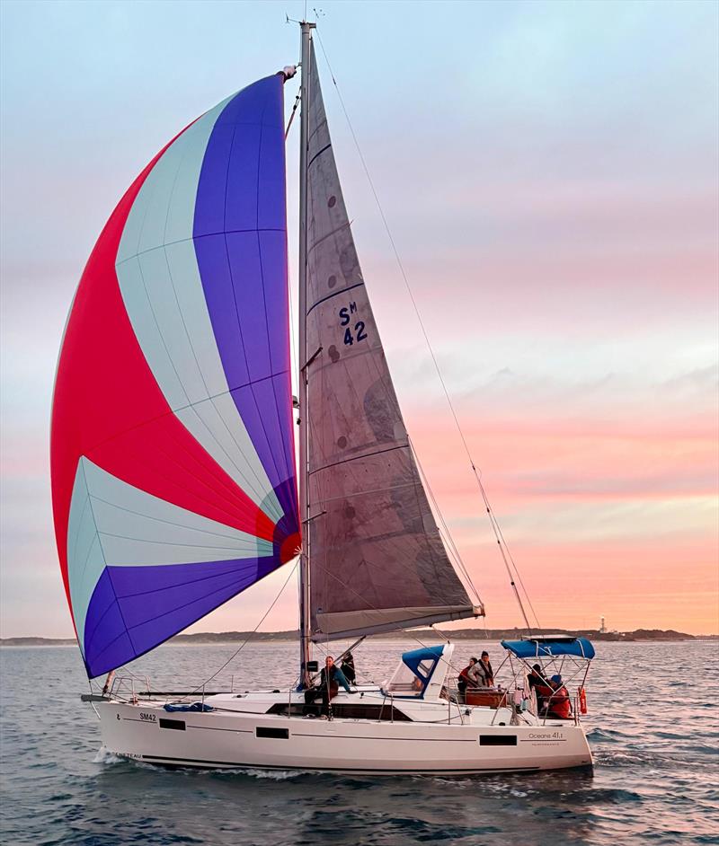 The colourful spinnaker of Hitchhiker - photo © Cyrus Allen