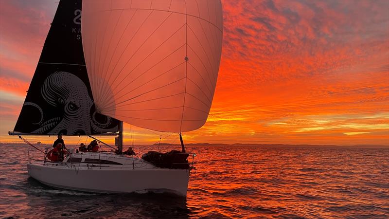 A saffron sunrise behind The Kraken overall winner - photo © Maddie Scambary