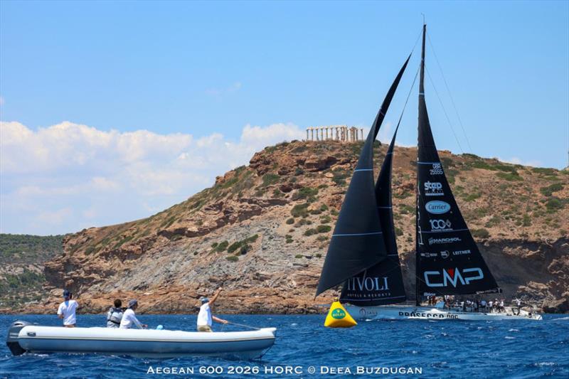PROSECCO DOC SHOCKWAVE (ITA) got the finishing gun salute as the first to cross the finish line at the 2500 year-old Ancient Temple of Poseidon, just 3 hours short of a new course record photo copyright Deea Buzdugan taken at Hellenic Offshore Racing Club and featuring the ORC class
